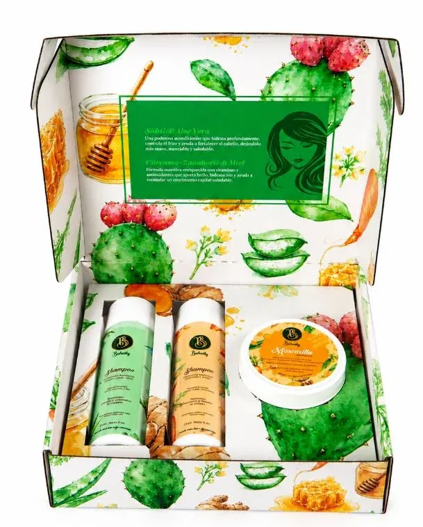 Kit Pelo Perfecto abierto, con dos shampoos y la mascarilla dentro de su caja ilustrada